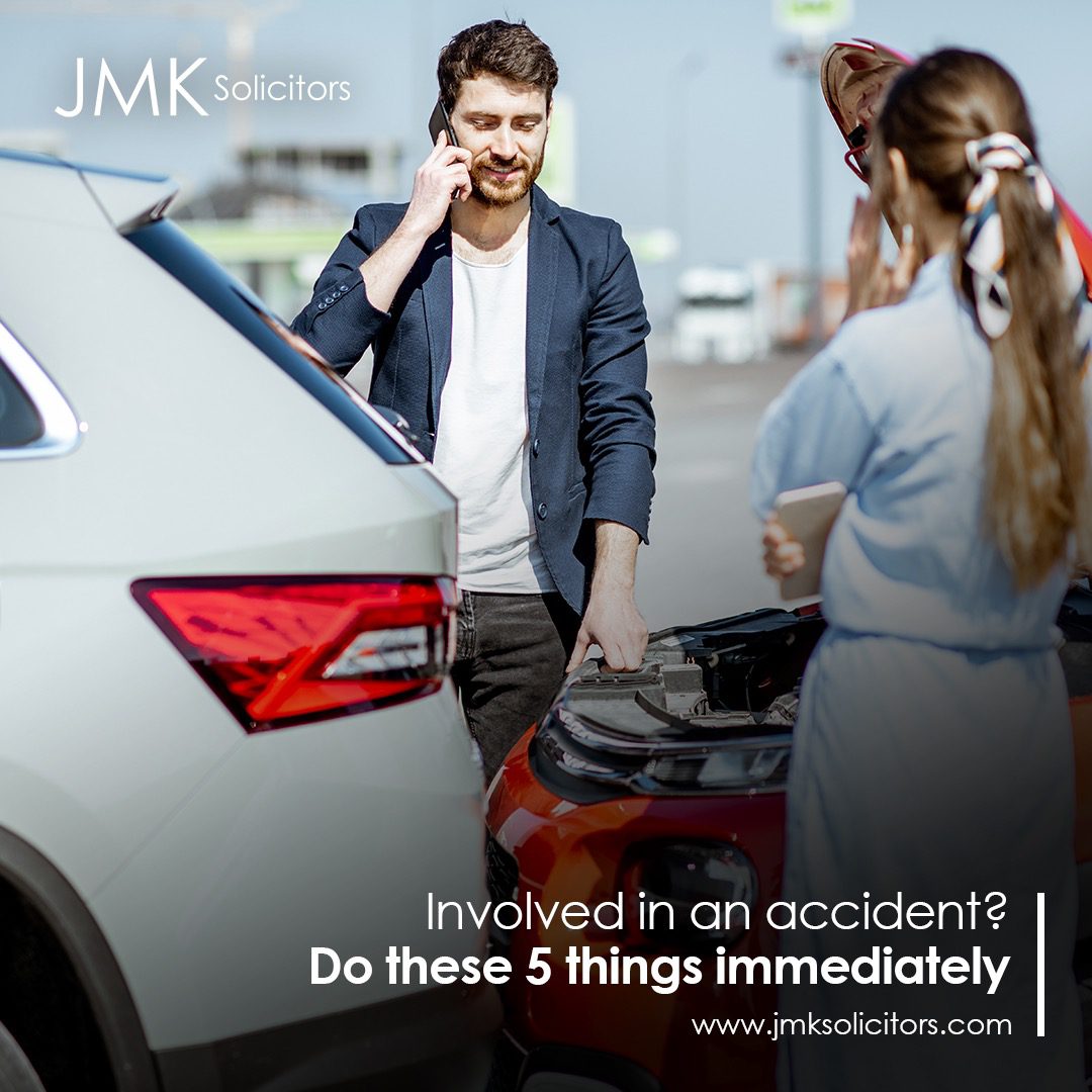 Involved in an accident? do these 5 things immediately. 2 people talking after being in an accident