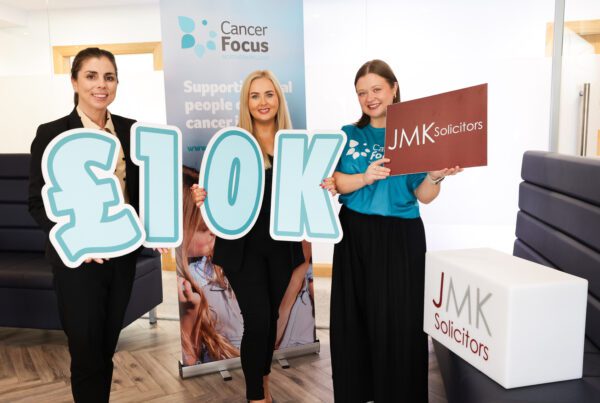 JMK Solicitors, CRASH Services, and Granite Exchange in Northern Ireland has raised £10,000 for Cancer Focus Northern Ireland
